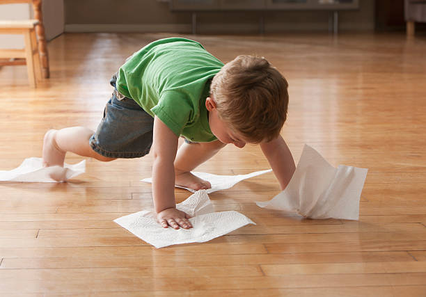 Kid playing with tissues | Carpet Selections